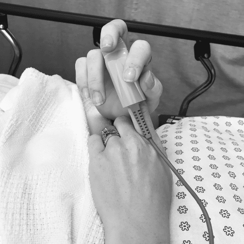 Woman in hospital bed Woman in hospital bed
