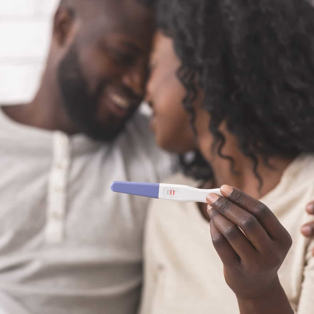 Happy Afro Couple Holding Pregnancy Test With Positive Result Pregnancy
