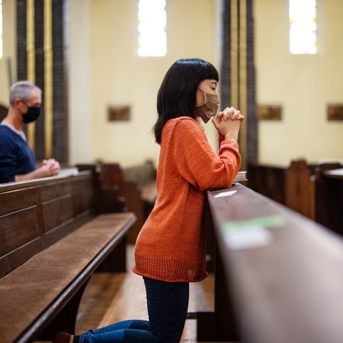 People In Church Praying With Covid 19 Restrictions Faith